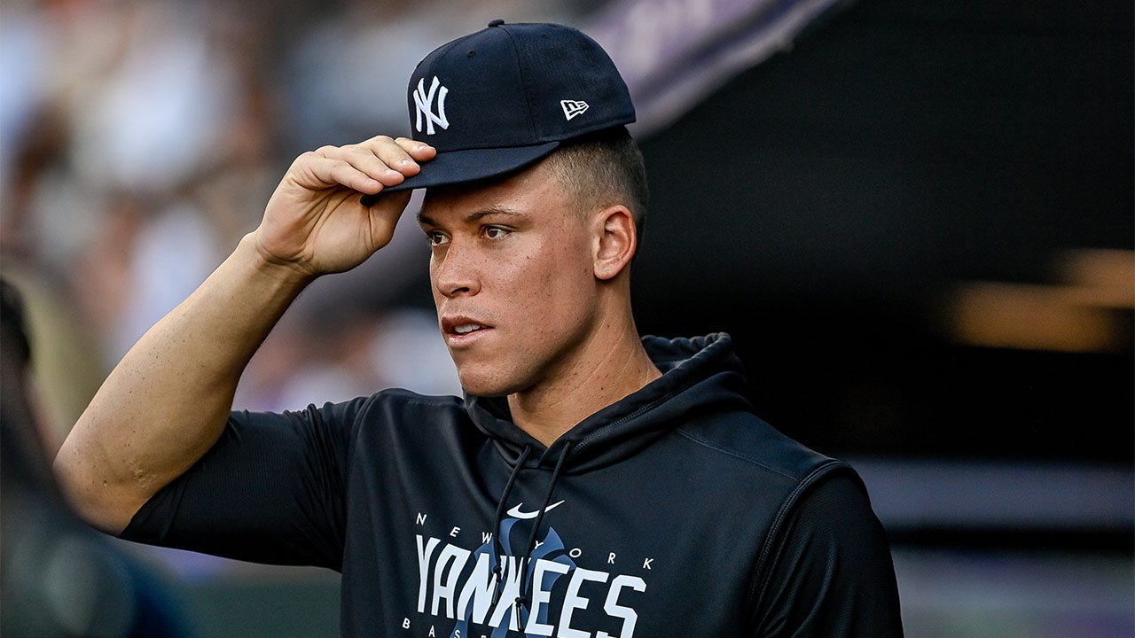 Aaron Judge watches from the dugout
