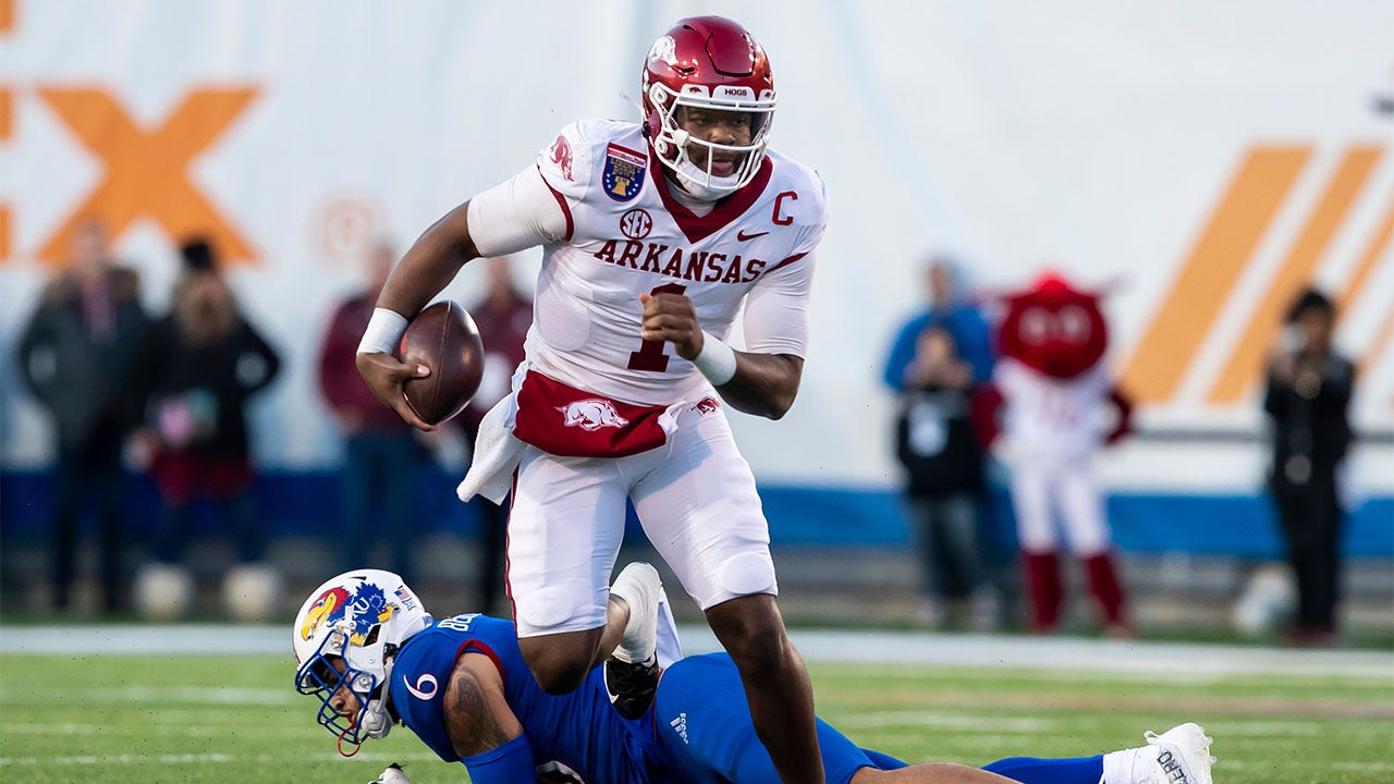 KJ Jefferson scrambles against Kansas