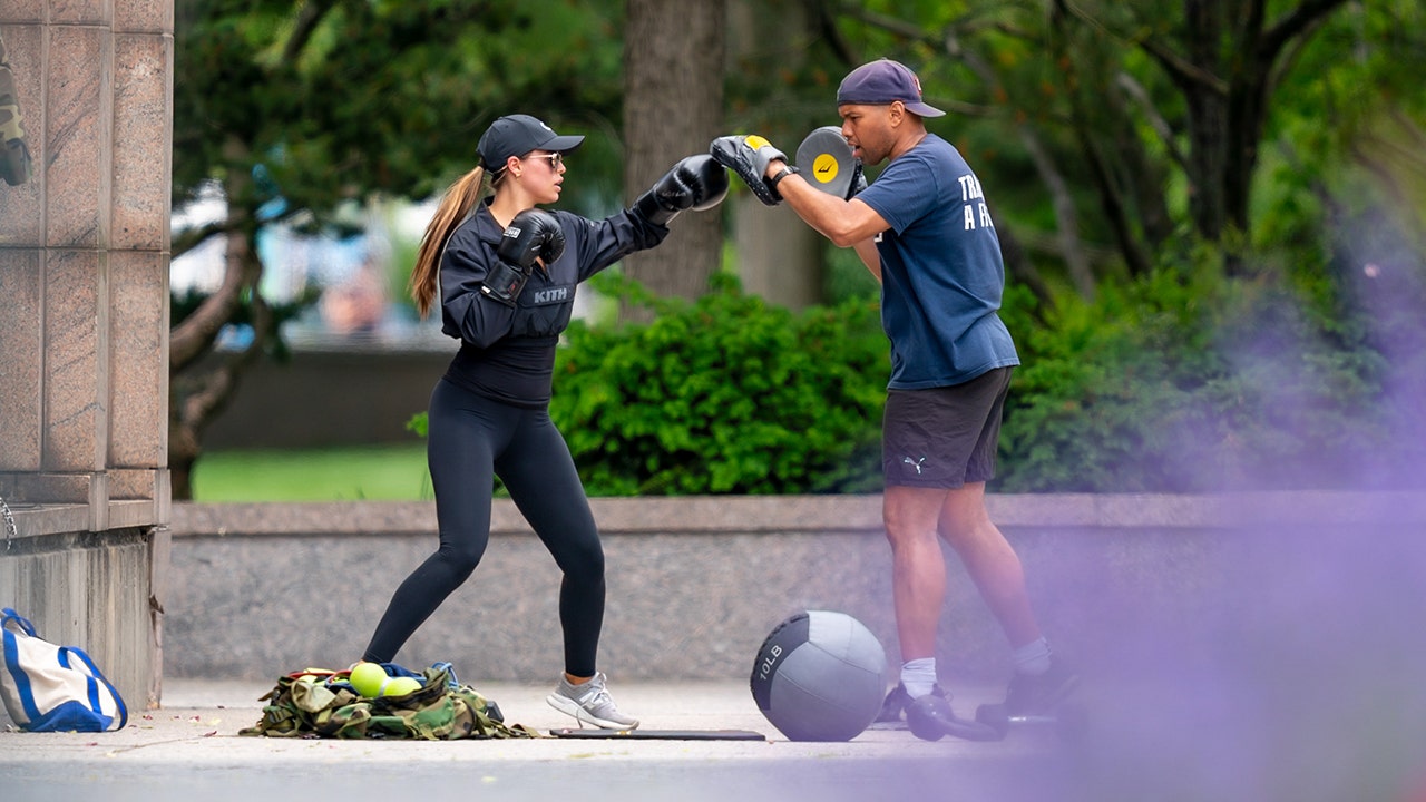 Brooks Nader wearing working gear while sparring outside