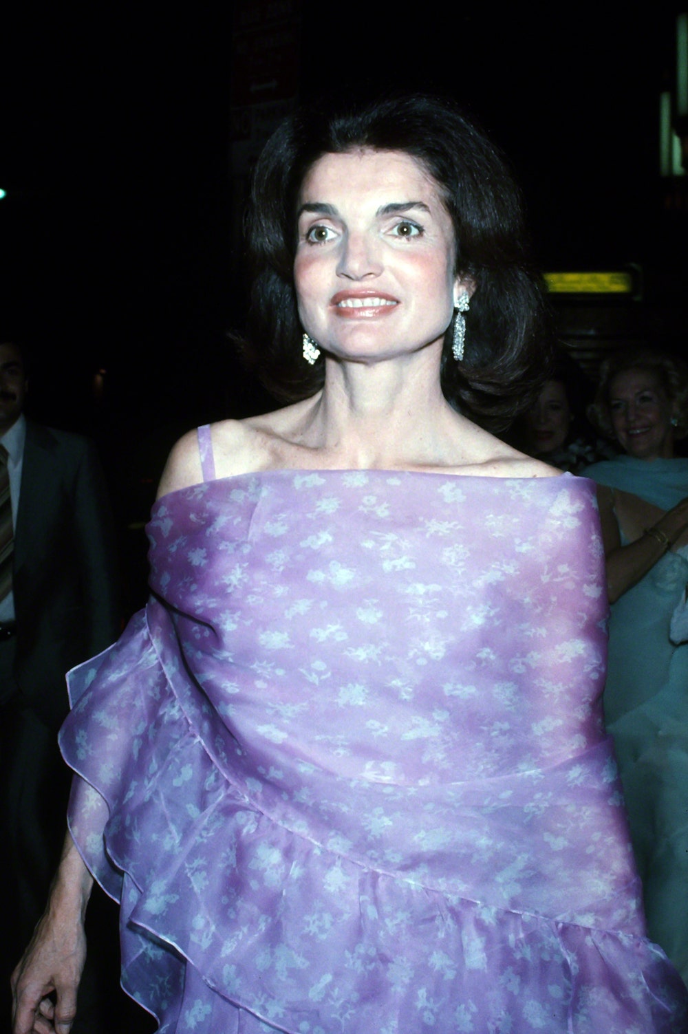 Jackie Kennedy wearing a formal lavendar gown
