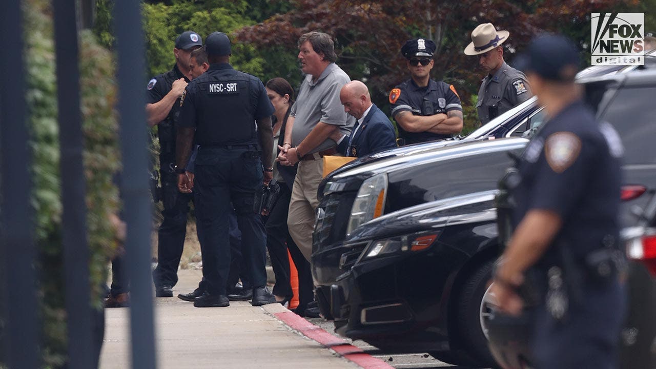 Rex Heuermann led into a Suffolk County courthouse