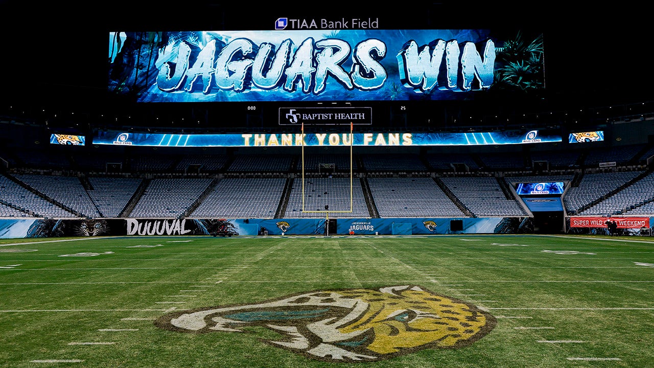 Videoboard reads 'Jaguars Win'