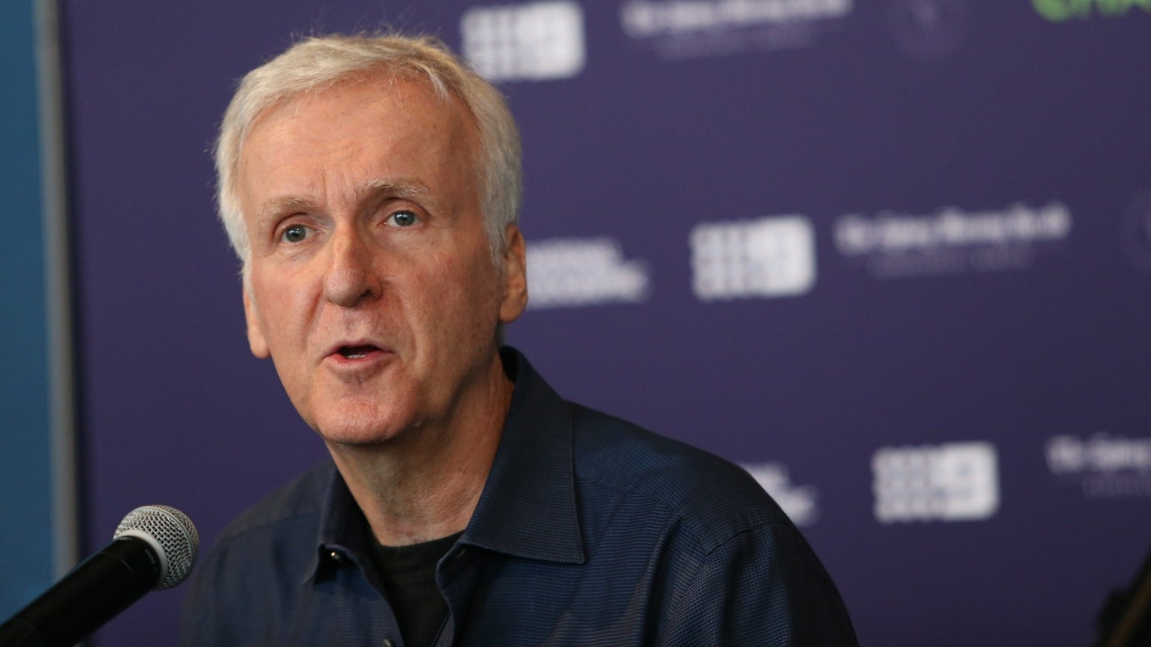 James Cameron at the microphone