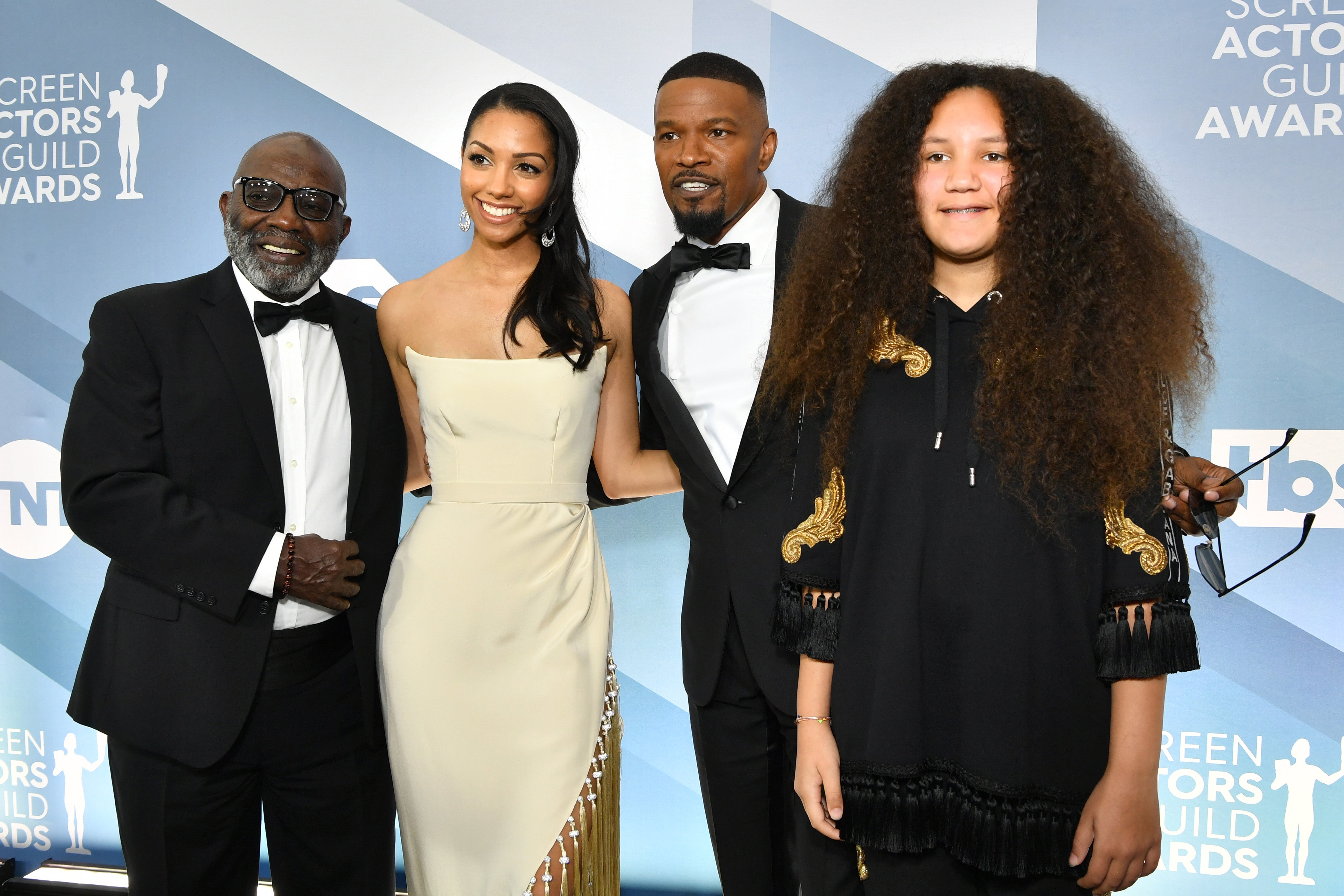 Left to right, George Dixon, Corinne Foxx, Jamie Foxx, and Anelise Bishop pose together