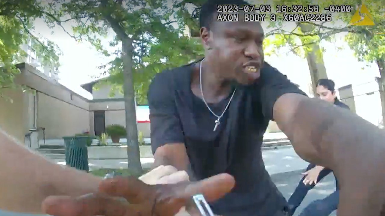 Body cam video shows moments before cop shot man reaching for officer's