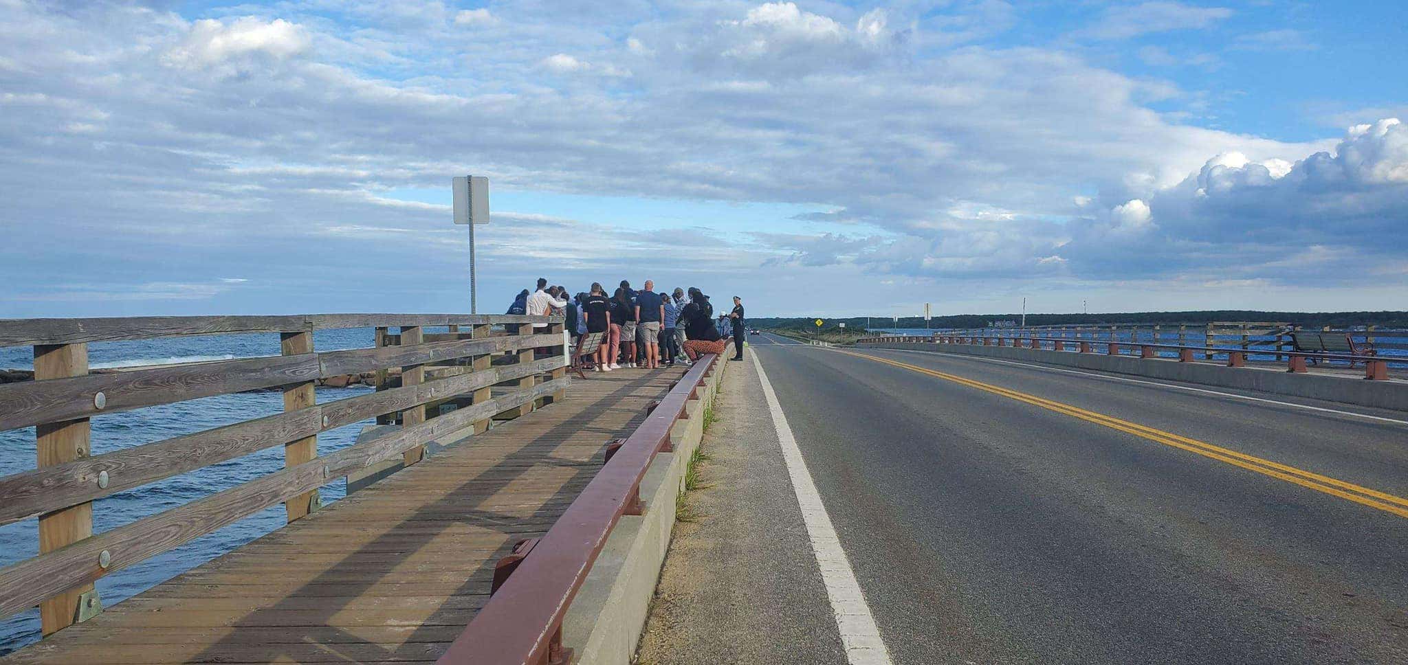 Mourners gather on Martha's Vineyard Jaws Bridge