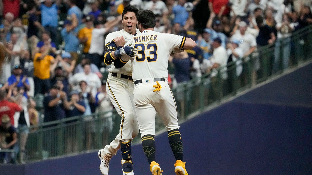 Brewers edge Reds in NL Central showdown with Christian Yelich's