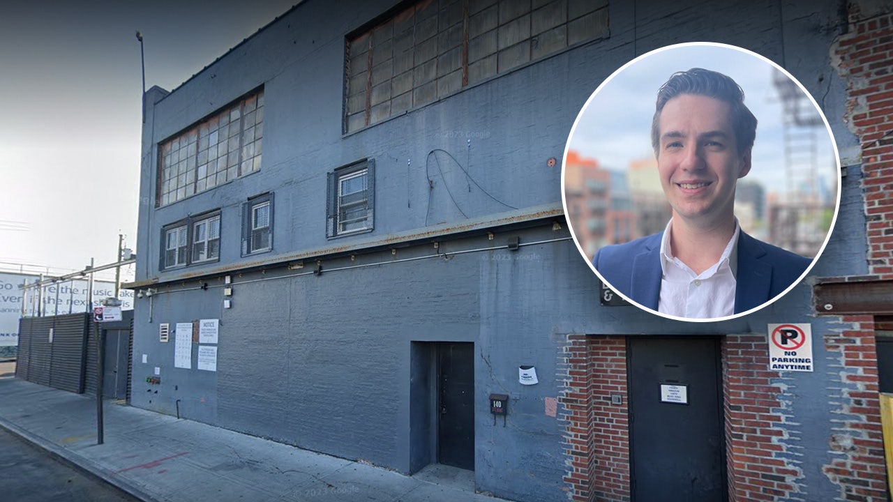 A gray and brick warehouse in Brooklyn.