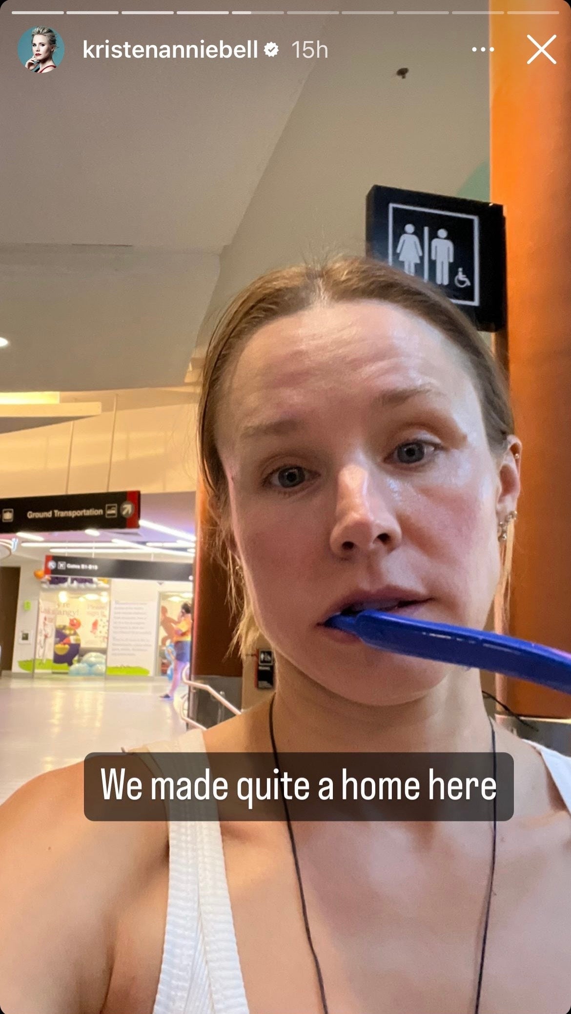 Kristen Bell brushing her teeth while stranded at the airport.