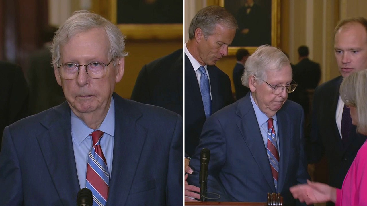 Senate Minority Leader Mitch McConnell freezes during press conference and is led away from podium