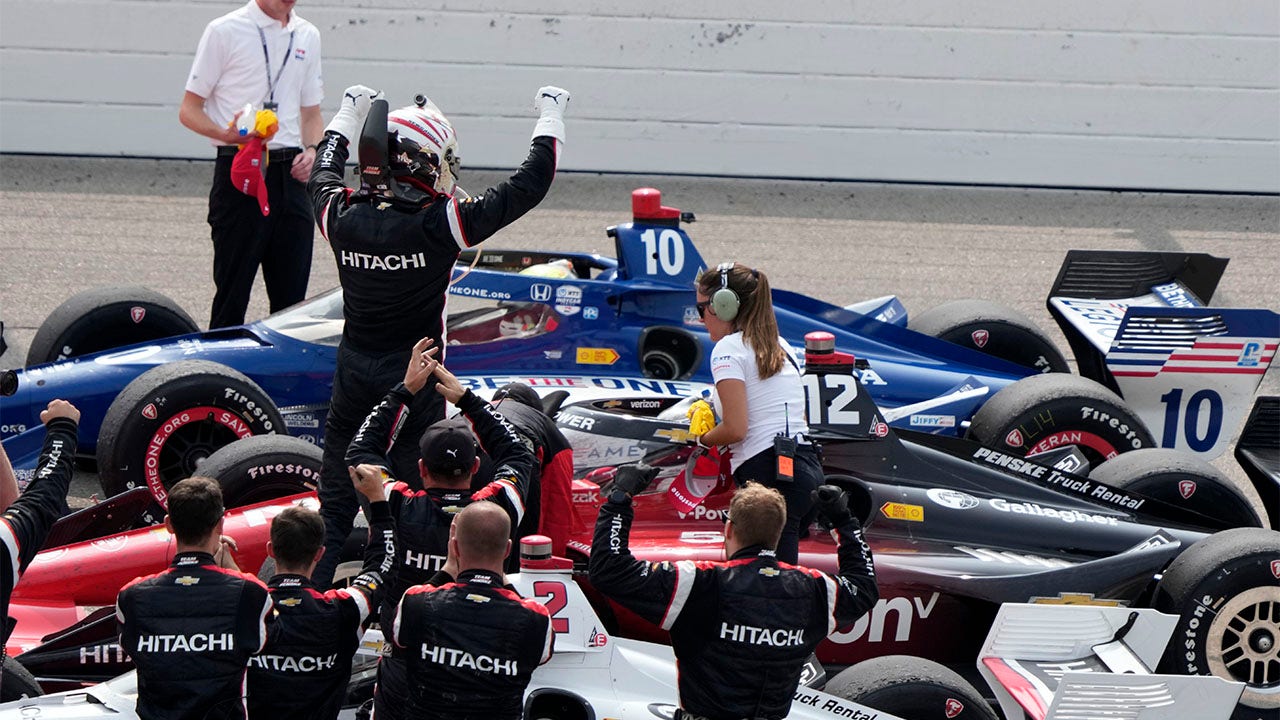 Josef Newgarden celebrates