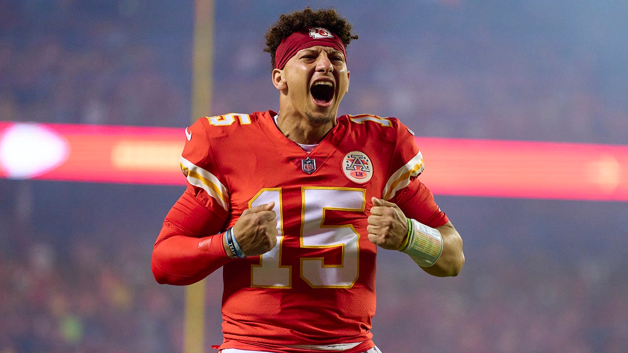 Photo shows Kansas City Chiefs players Patrick Mahomes, Travis