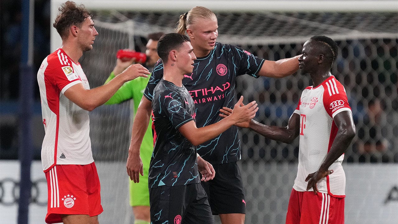 Erling Haaland and Sadio Mane greet