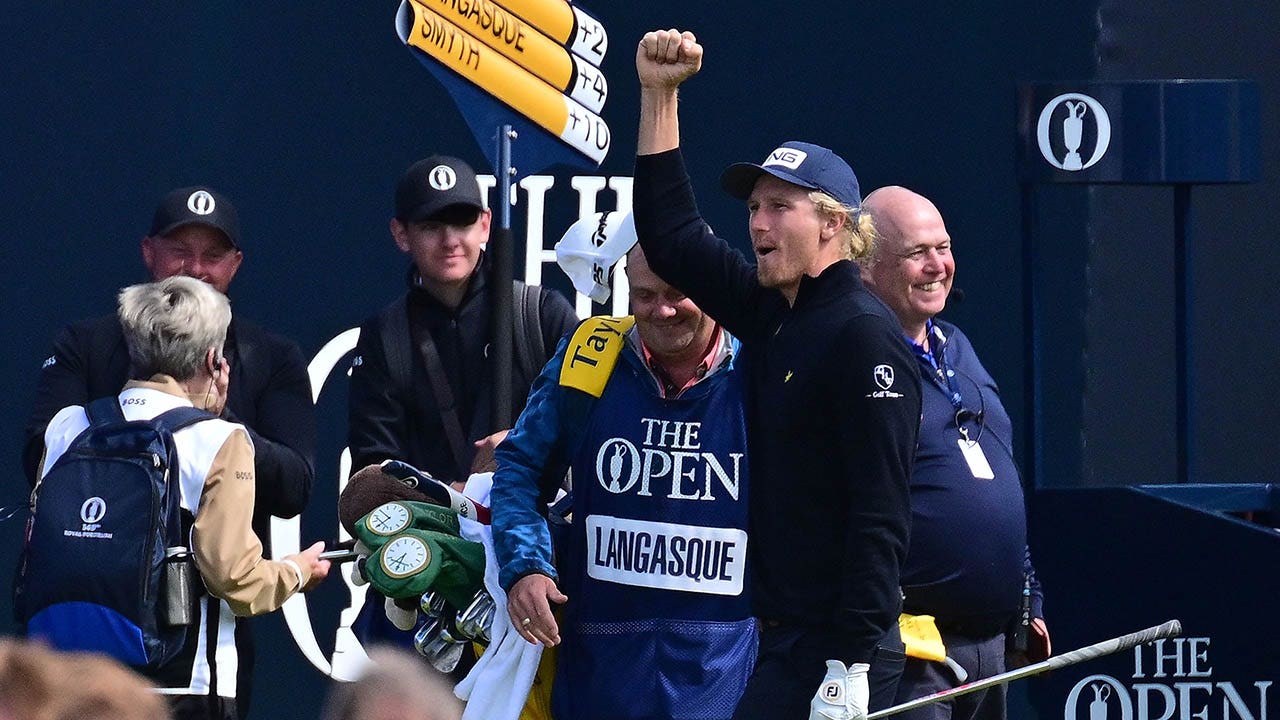 Travis Smyth celebrates his hole-in-one