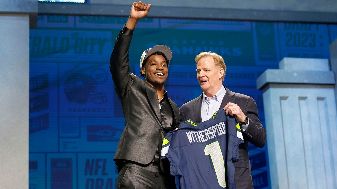 Devon Witherspoon with Roger Goodell