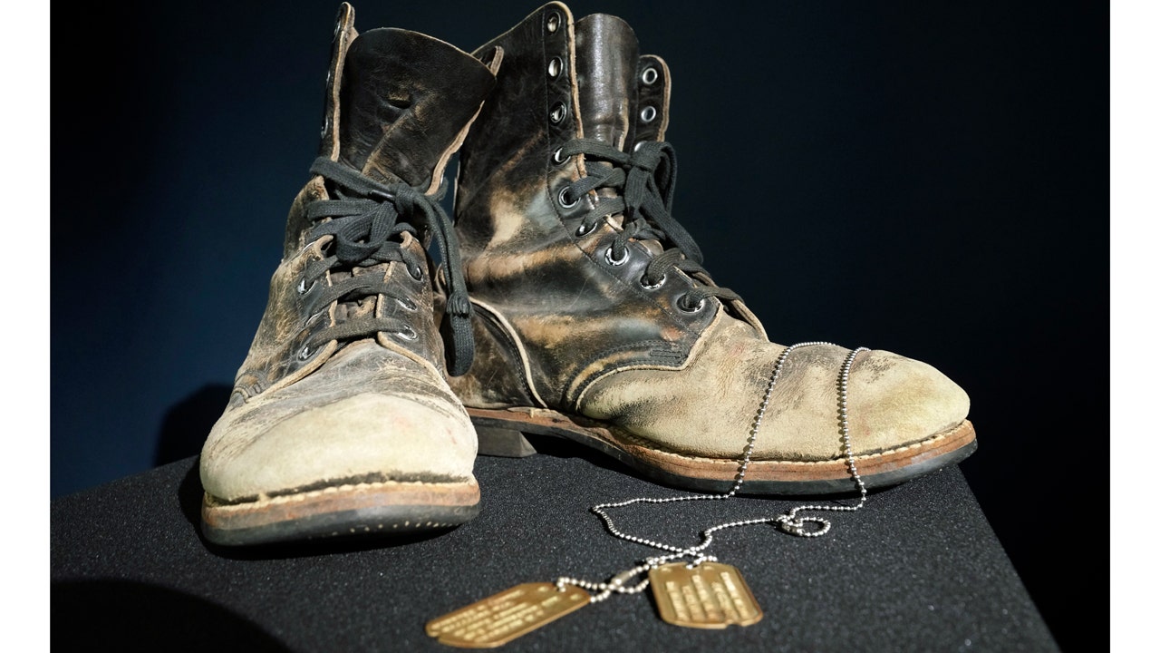 Boots and dog tags worn by "M*A*S*H" star Alan Alda