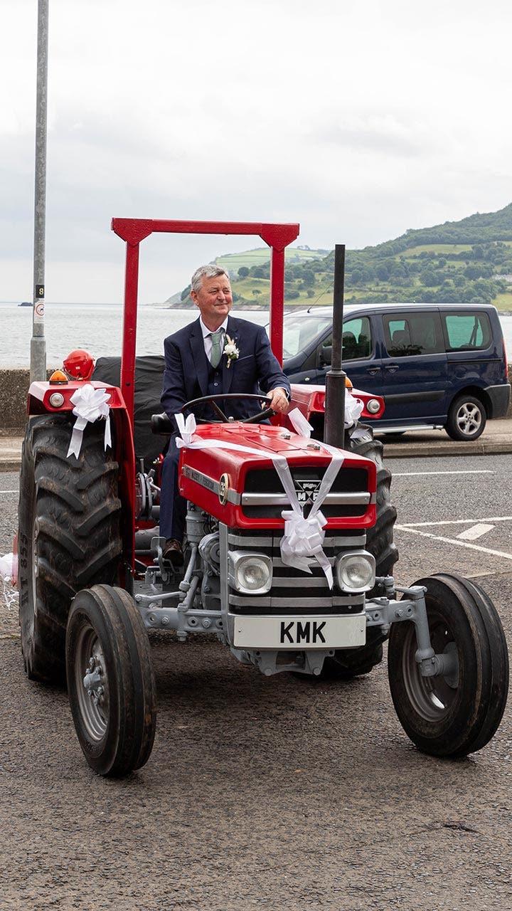 Kathryn McKay's dad drives tractor