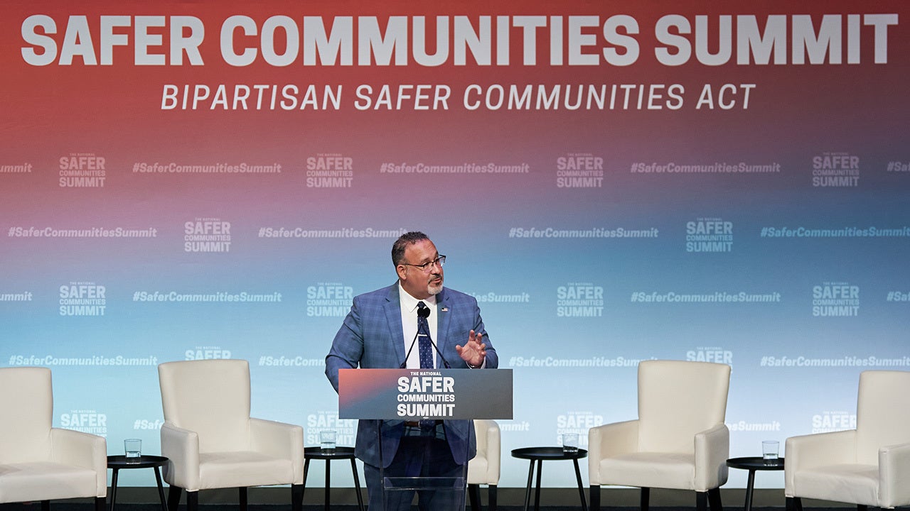 Miguel Cardona, US secretary of education, speaks during the National Safer Communities Summit at Hartford University in West Hartford, Connecticut, US, on Friday, June 16, 2023. The Biden administration is taking steps to make it easier for young people, particularly those affected by violence, to receive mental health services, part of a move to bolster federal gun-safety efforts following the Bipartisan Safer Communities Act that was signed into law last year. Photographer: Bing Guan/Bloomberg
