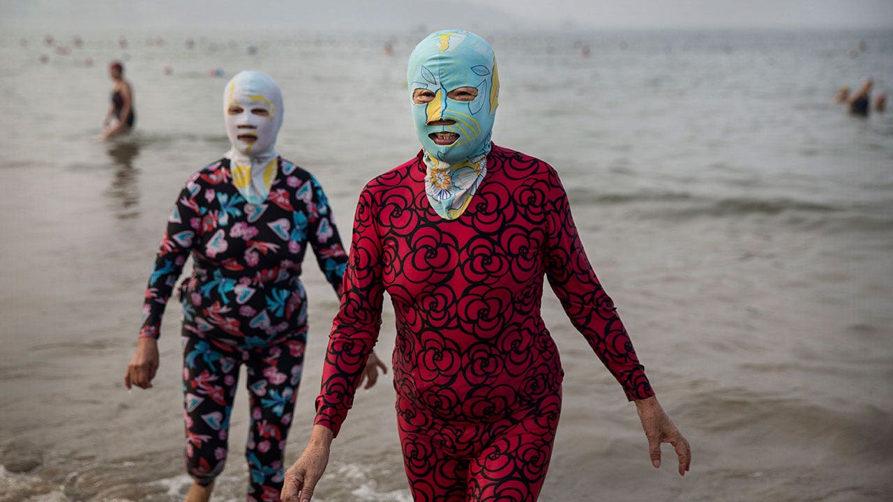 Bizarre 'facekinis' fashion craze hits China beaches amid record heat | Fox  News