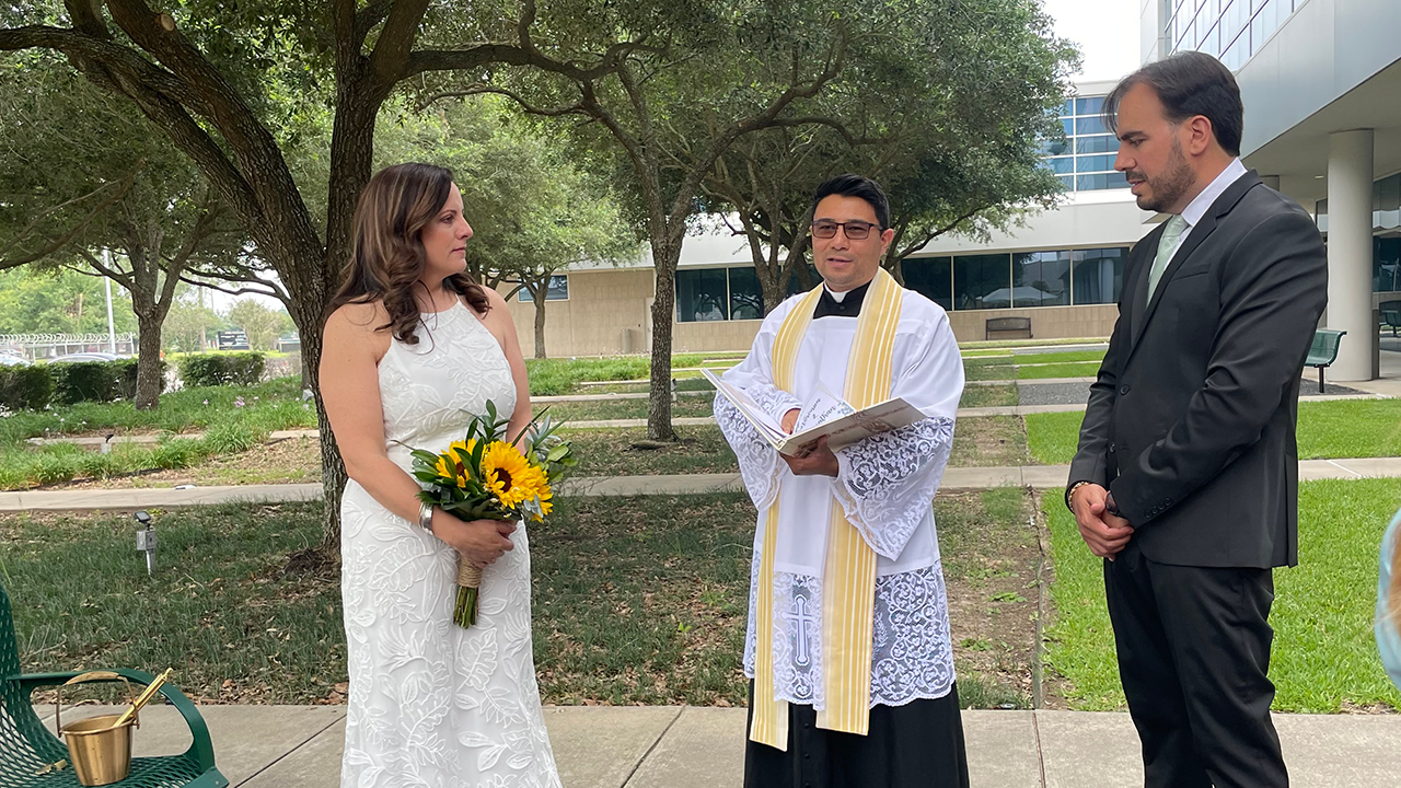 tatiana palza with husband and priest