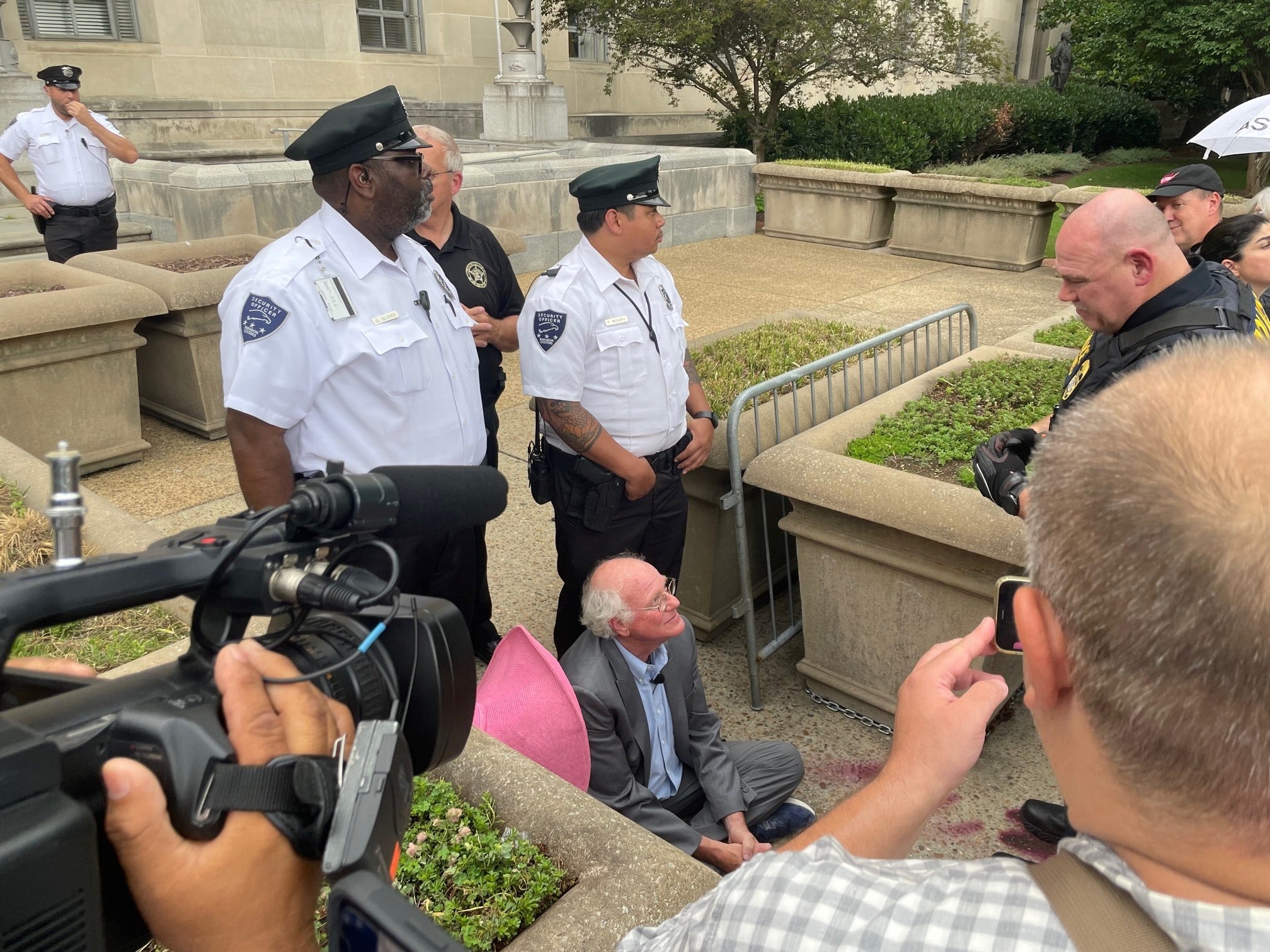 Ben & Jerry's founder questioned by police outside DOJ during protest