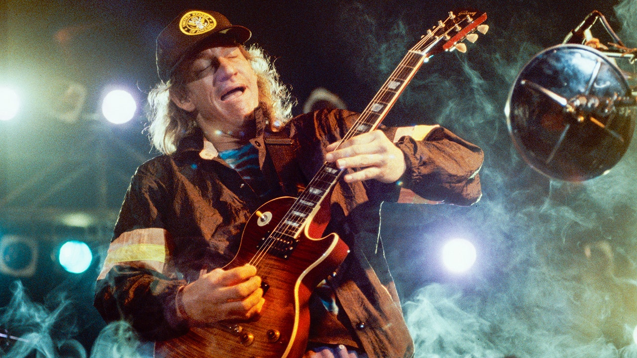 Joe Walsh performing in April 1990