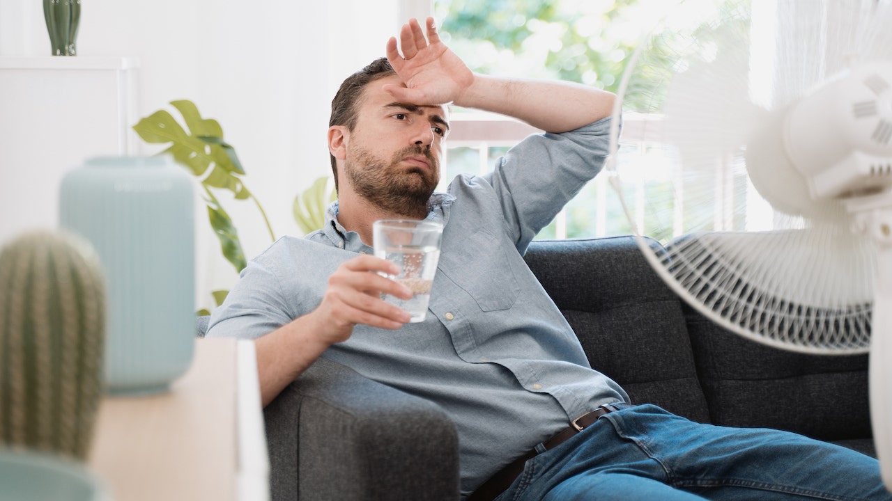 Man sweating in heat