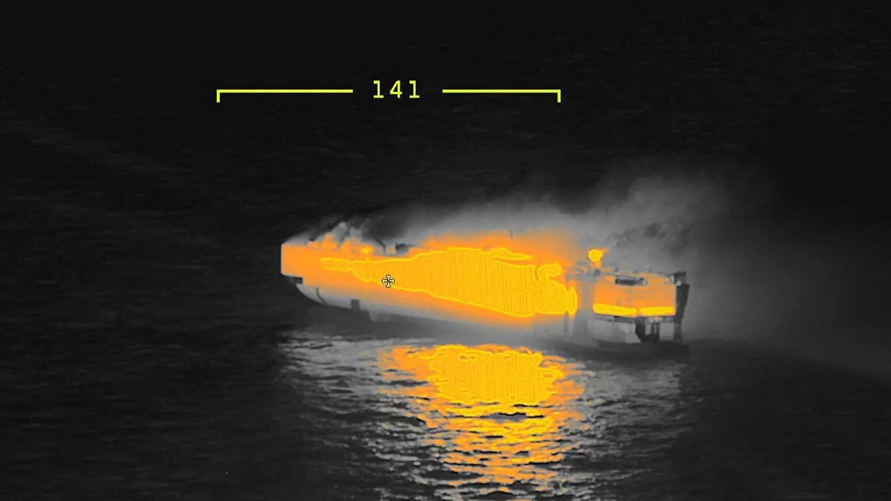 A thermal camera shows the cargo ship Fremantle Highway, on fire at sea