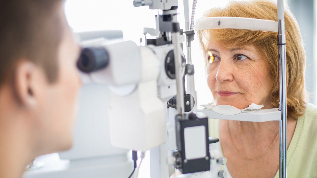 Older woman eye exam