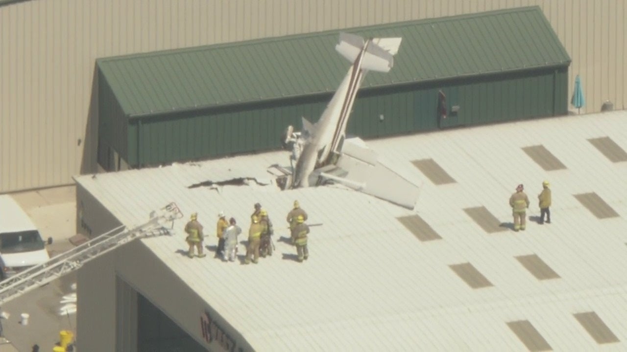 Small plane crashes into Southern California airport roof, buried nose first