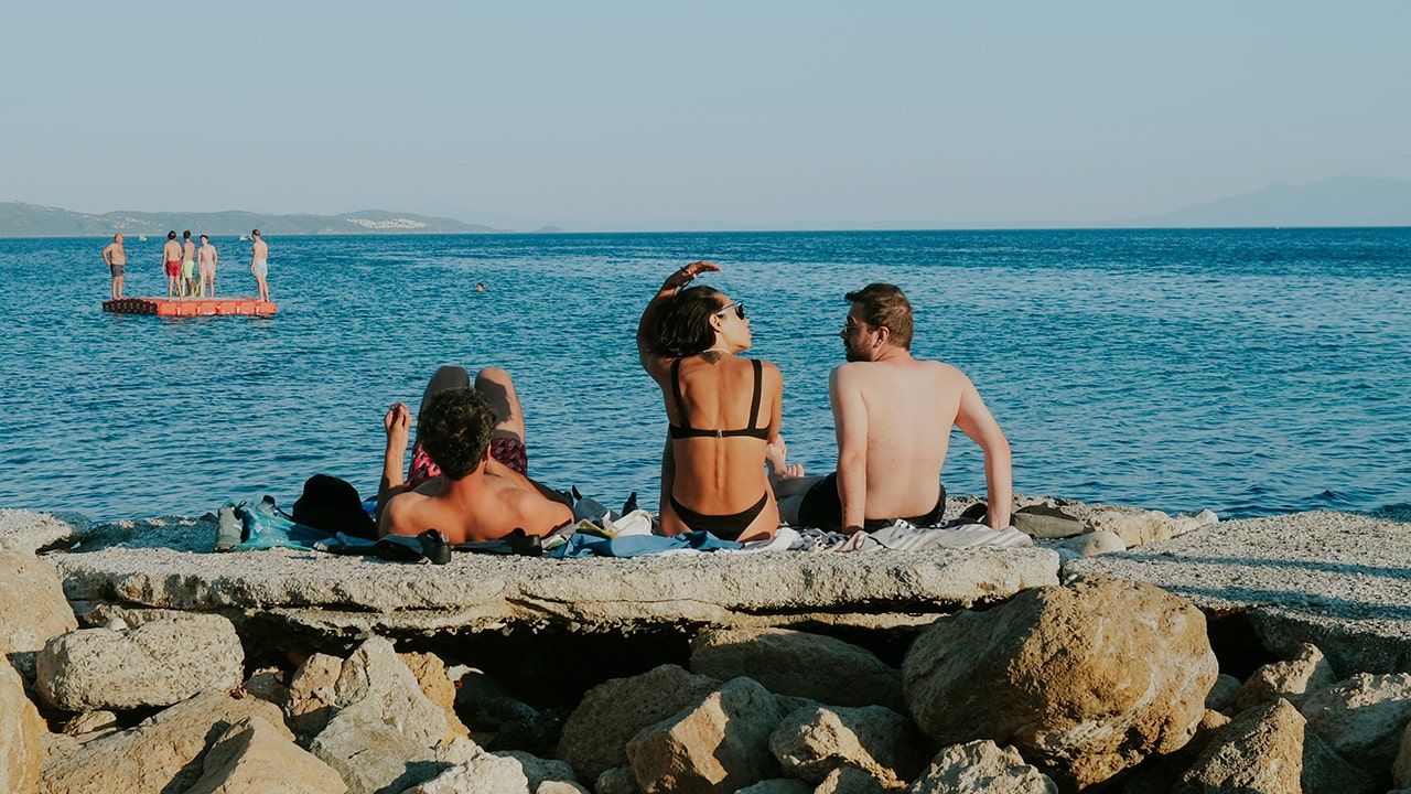 People tanning at the beach