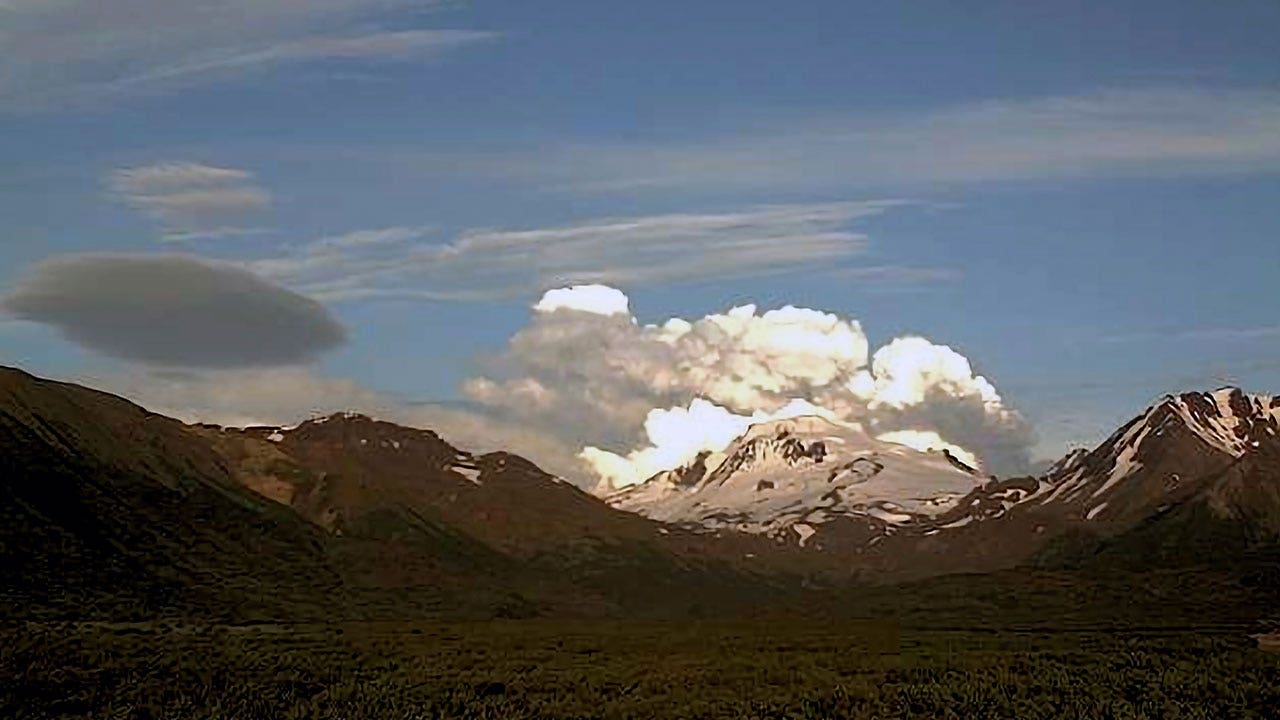 Alaska volcano eases after spewing massive ash cloud
