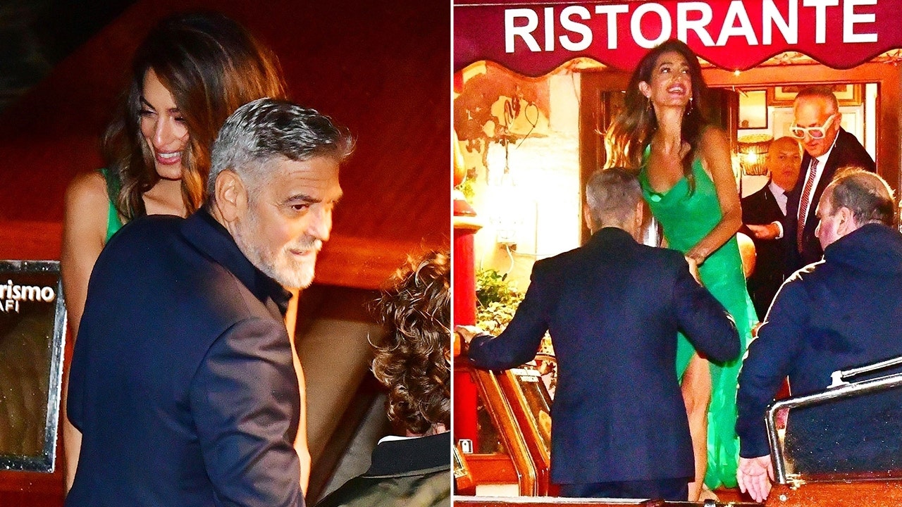 George Clooney plays leading man to wife Amal in Venice as she receives major honor
