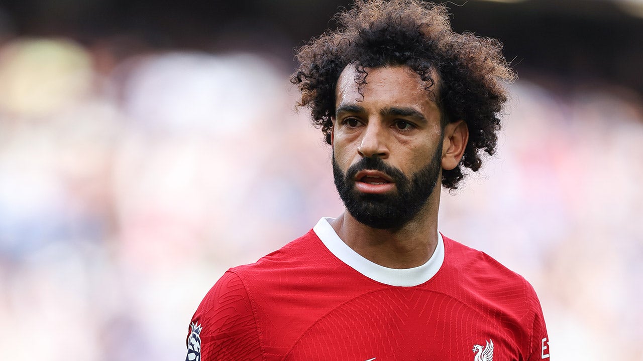 Liverpool's Mo Salah appears unhappy after getting subbed off in ...