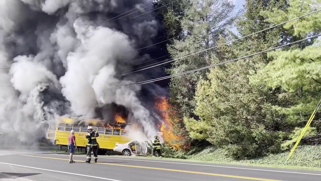Driver dies in fiery crash with New York school bus returning from field trip: video