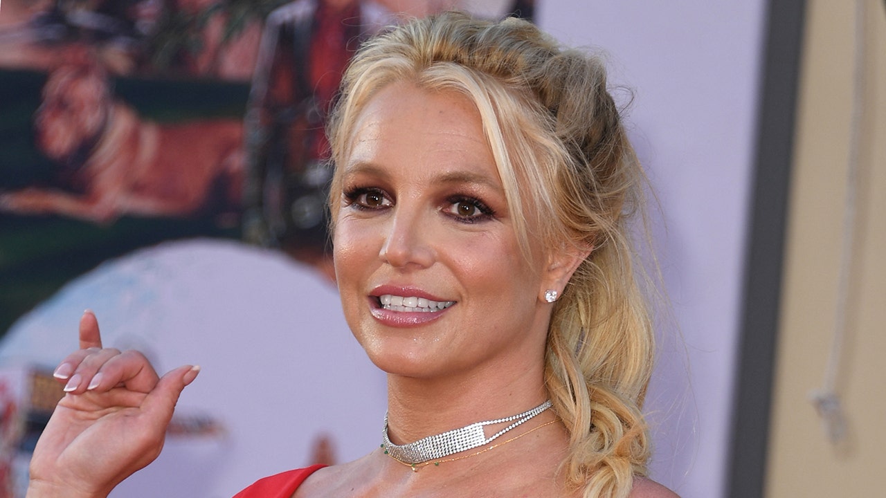 Britney Spears shows new snake tattoo while enjoying a Western retreat weekend