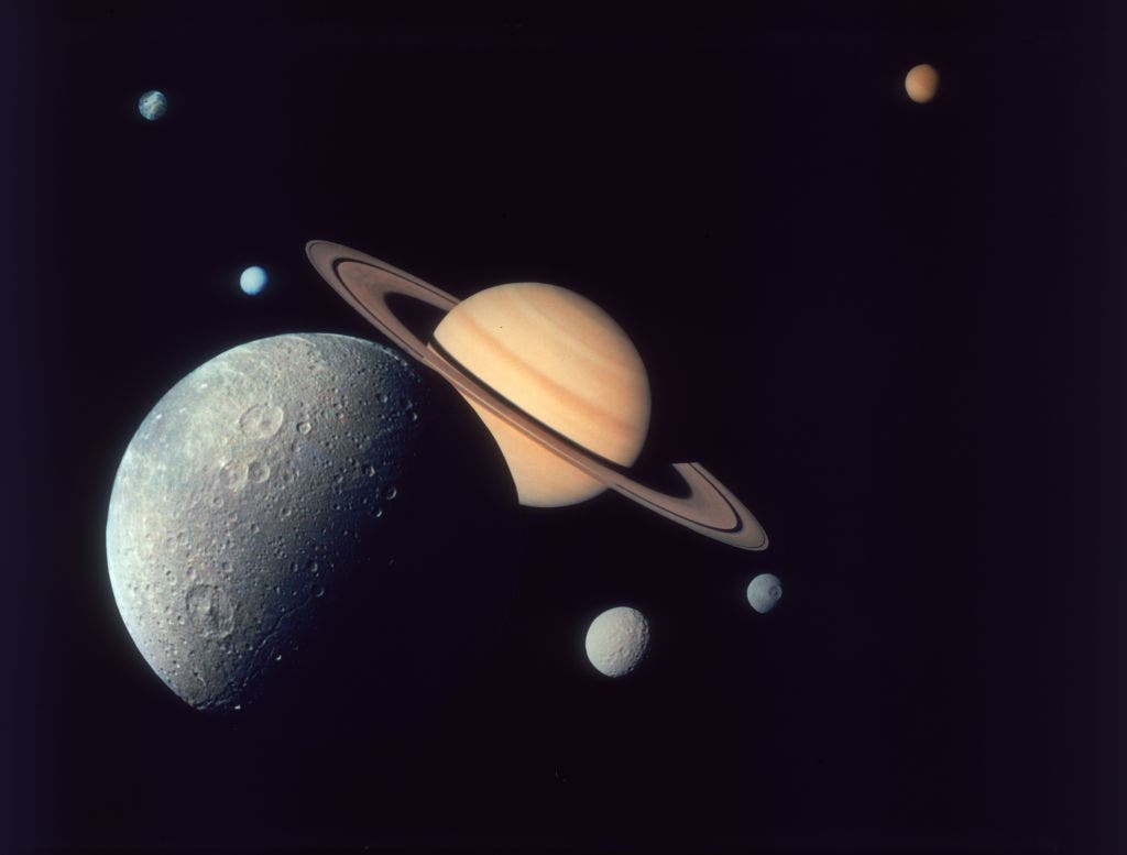 NASA publishes never-before-seen photos of 'ravioli' moon orbiting Saturn