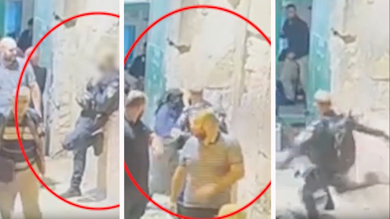 Palestinian woman kicked, knocked to ground after trying to stab Israeli police officer in Jerusalem