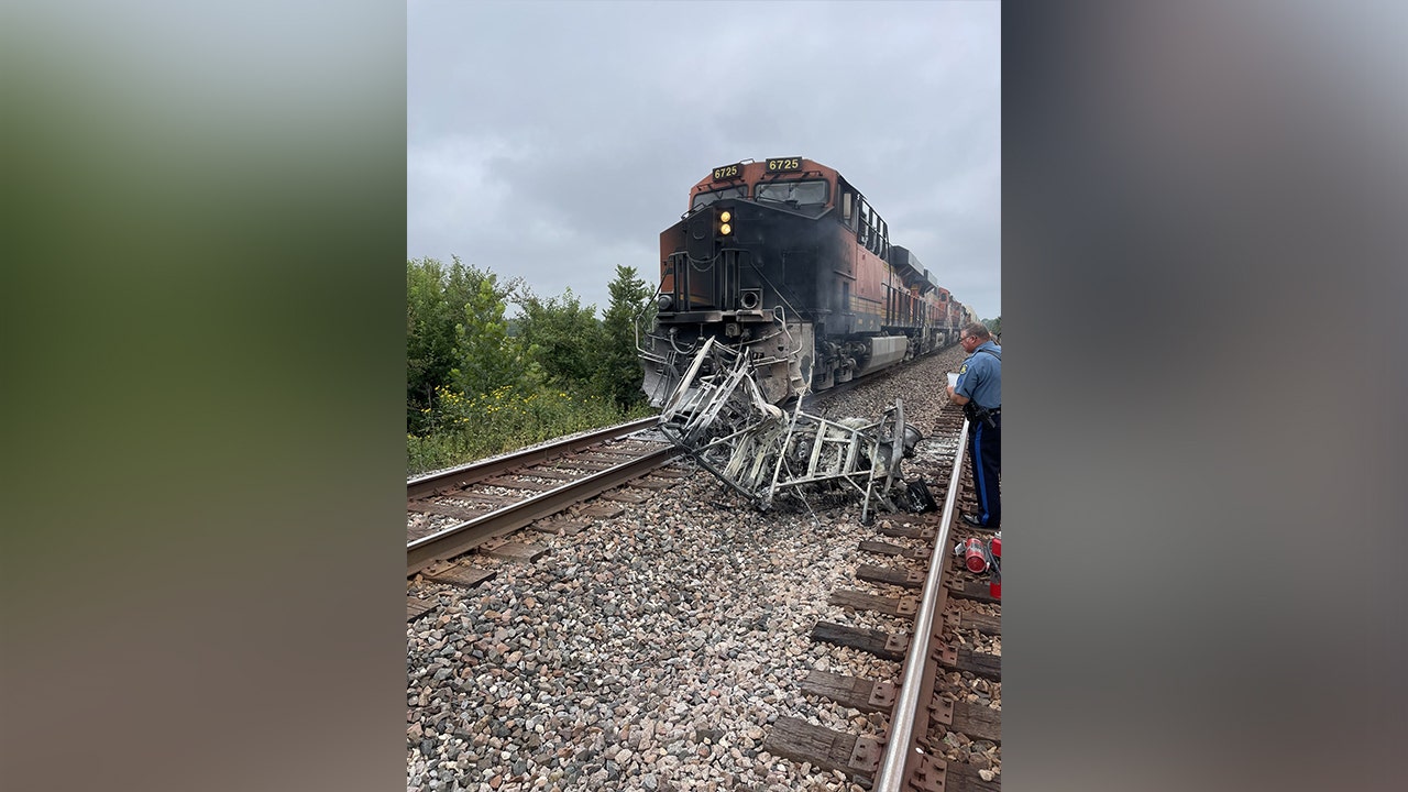 Photos show mangled metal mess after freight train crashes into ATV