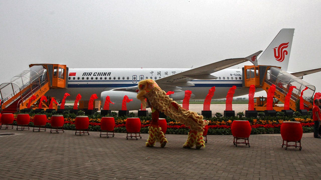 Passengers evacuated in Singapore after engine fire fills cabin of Air China jet with smoke