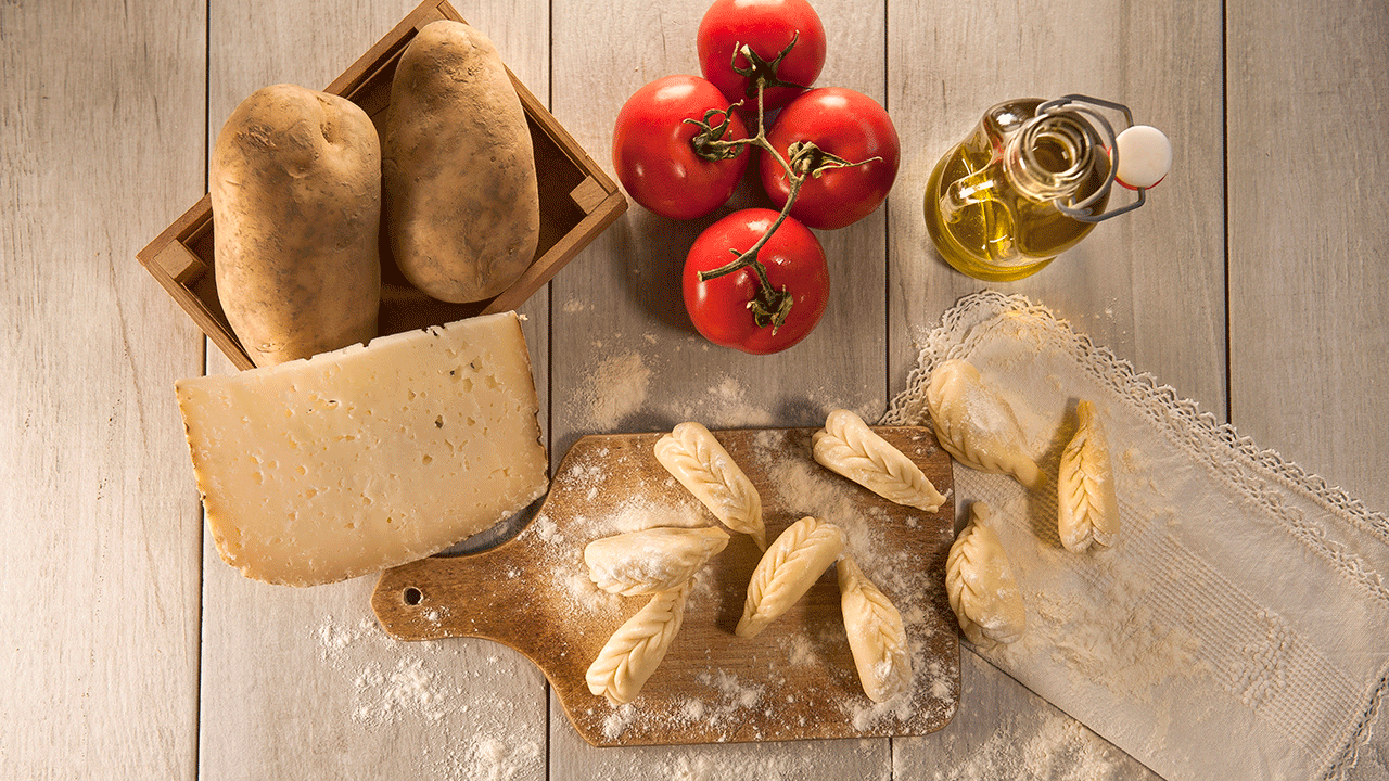 Pasta, cheese, tomatoes and olive oil