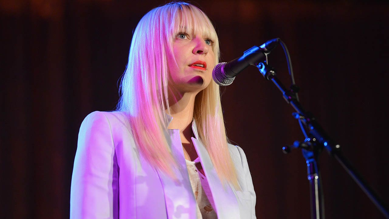 Sia reveals she was 'severely depressed' and 'in bed for three years' after divorce: 'A dark time'
