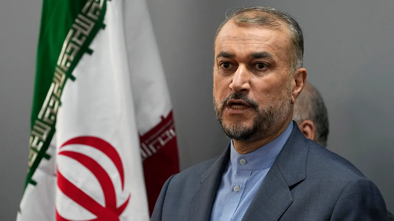 Iranian official who reportedly helped Hamas plan Israel attack is seen shaking hands with UN aid leader