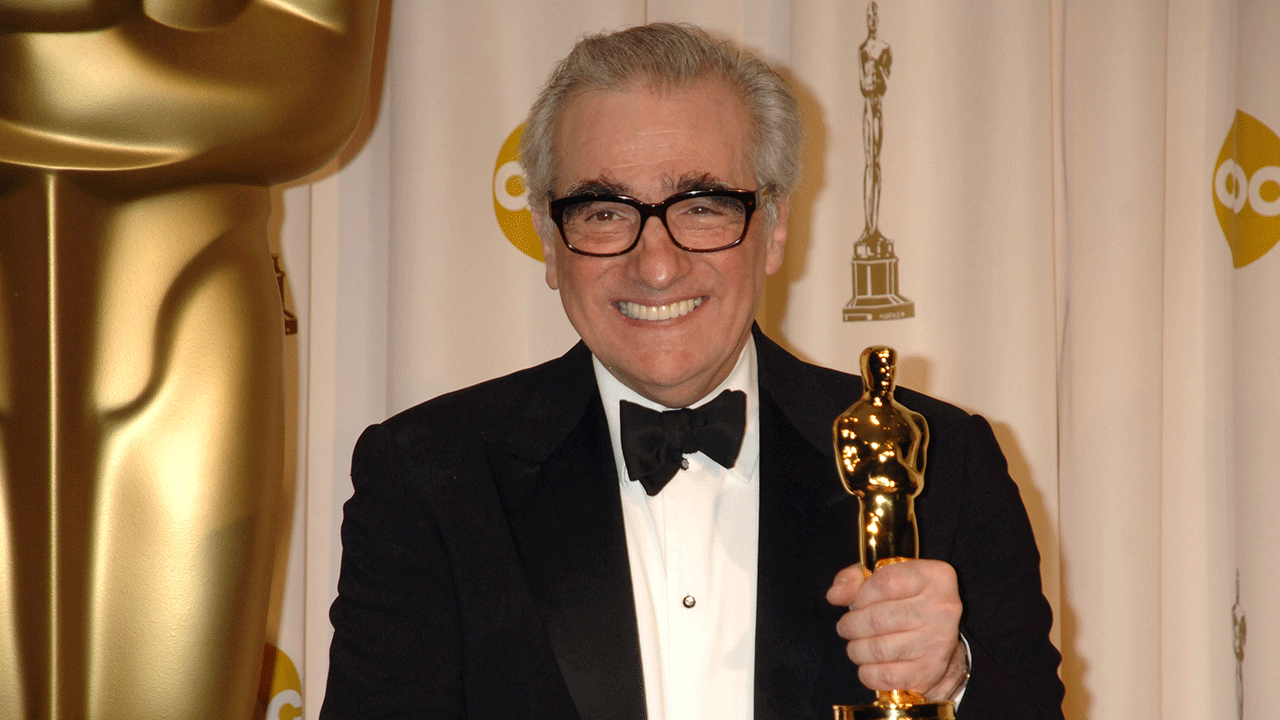 Martin Scorsese holding an Academy Award