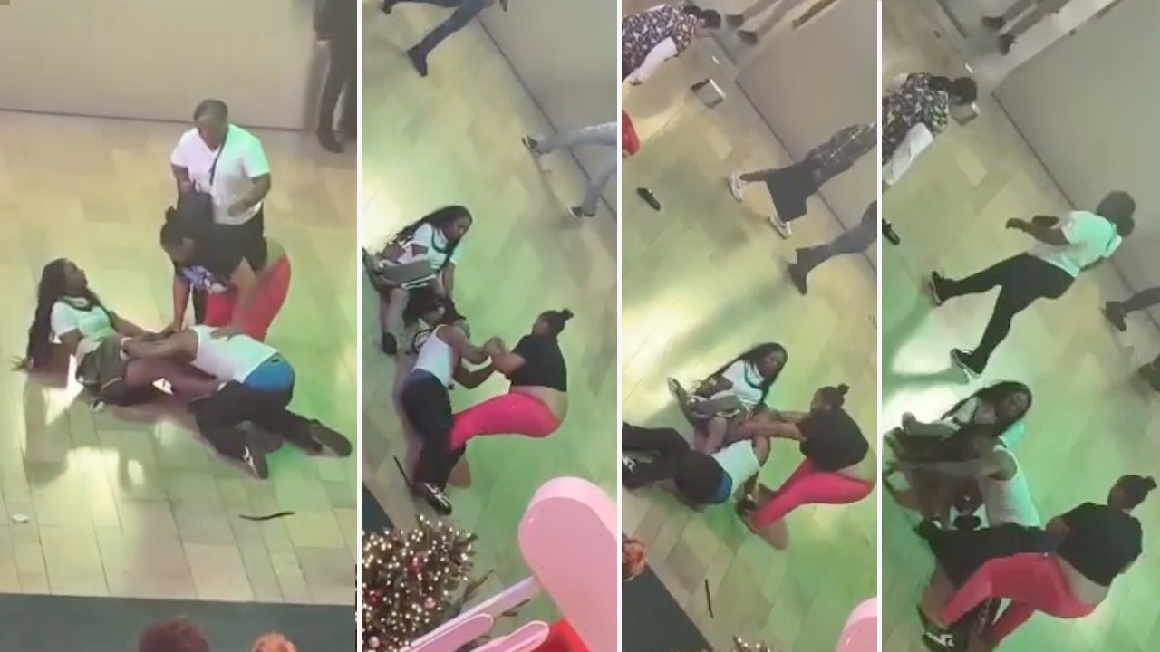 Man gets whooped by enraged women, with one trying to strip his pants off, in Black Friday mall brawl