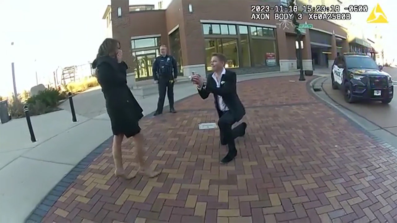 Wisconsin police help man stage marriage proposal in heartwarming bodycam video