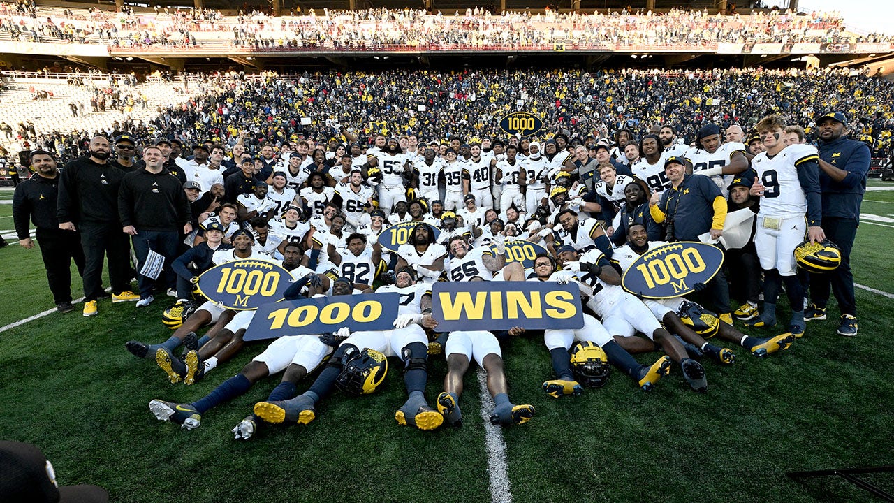 Michigan becomes first program to win 1,000 games, remains undefeated as Jim Harbaugh’s ban continues