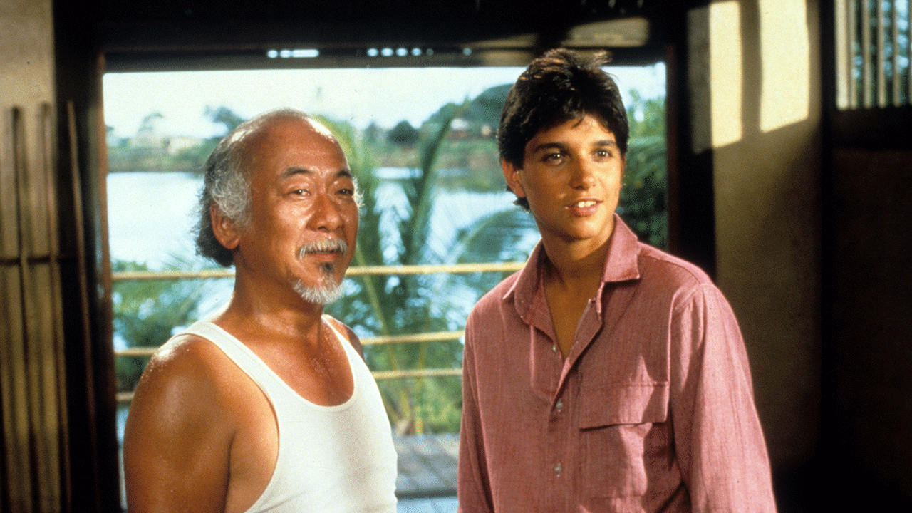 Pat Morita and Ralph Macchio in "The Karate Kid"