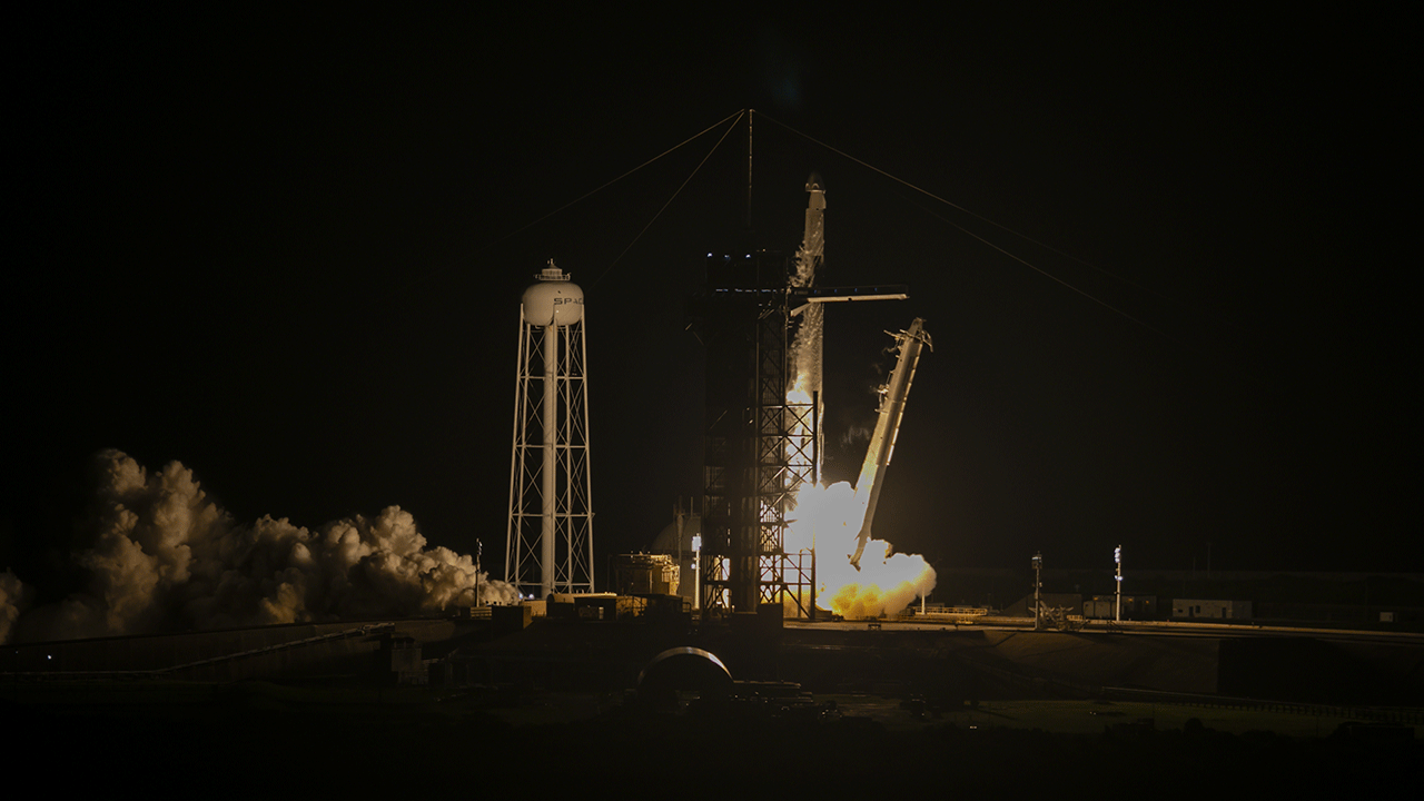 SpaceX Falcon 9 rocket and Dragon spacecraft carrying civilians takes off