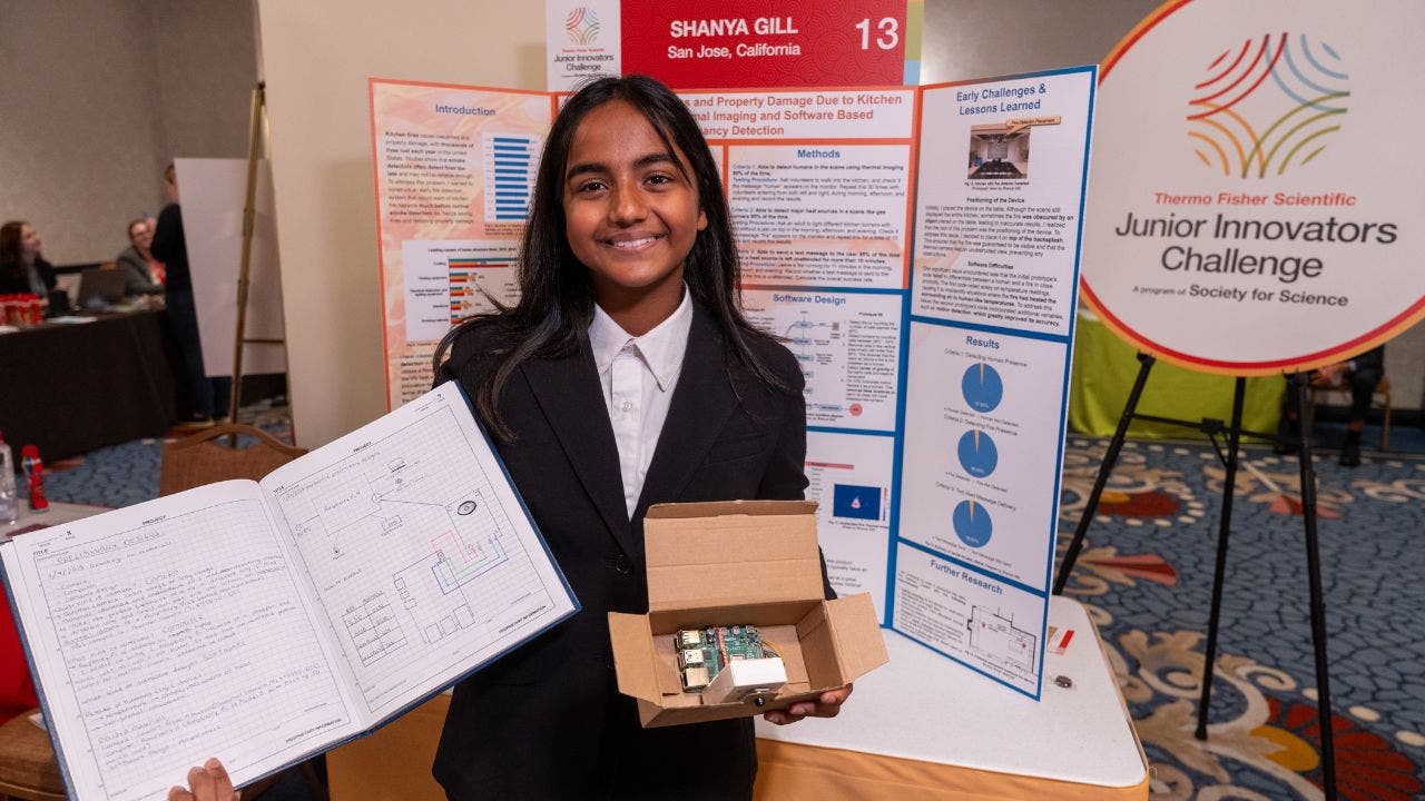 2 a 12 year old girl invents a life saving fire detector shanya holding instructions and device
